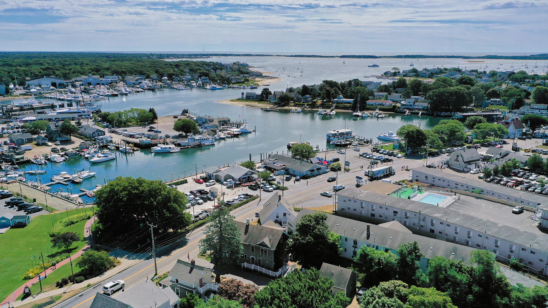 an aerial view of HI Hyannis hostel with the harbor nearby