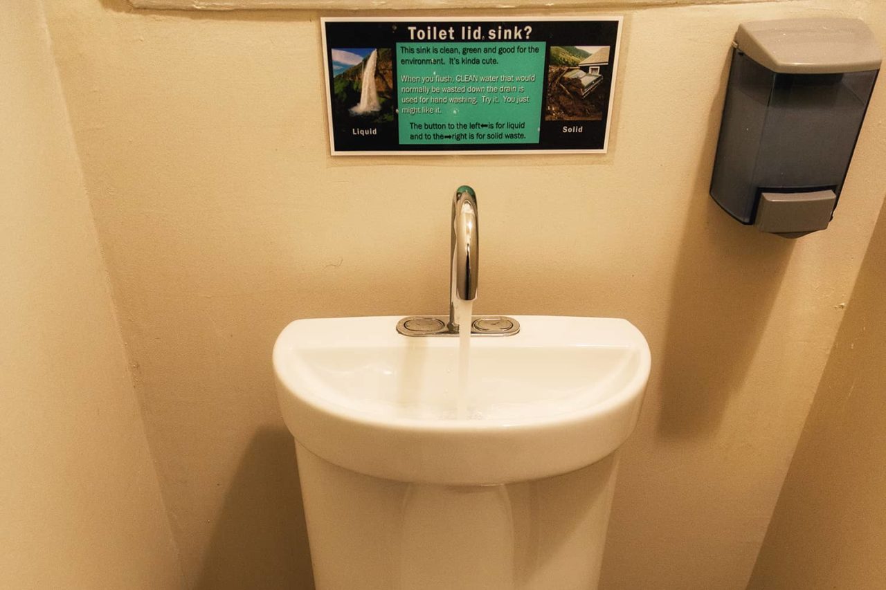 a sink in the restroom of HI San Francisco Downtown hostel conserves water