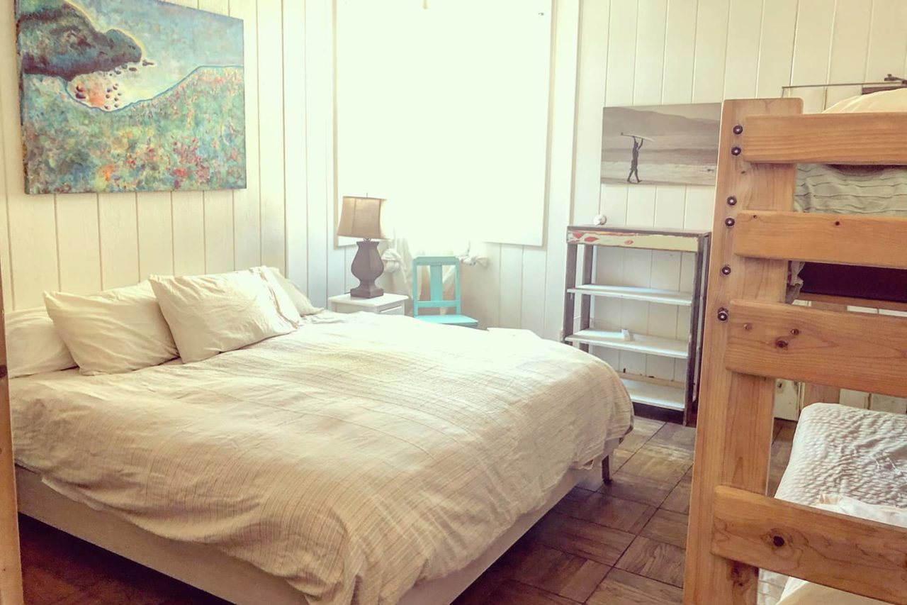 a bedroom in the historic lodge at HI Point Reyes