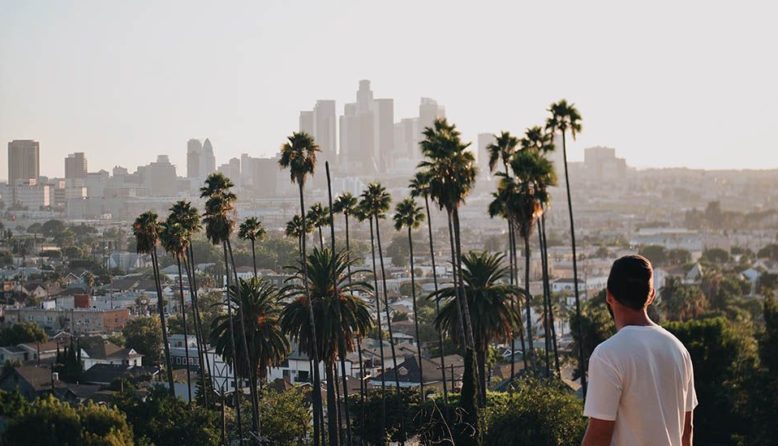 A man looking at Downtown Los Angeles