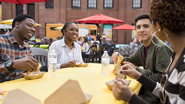 group of travelers together in Boston