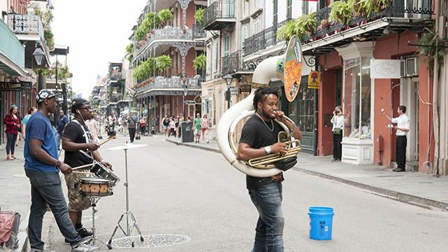 a band plays in New Orleans French Quarter