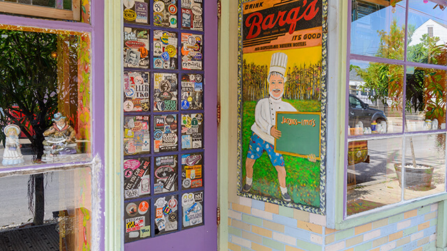 the colorful storefront of the Jacques Imo's restaurant on Oak Street in New Orleans