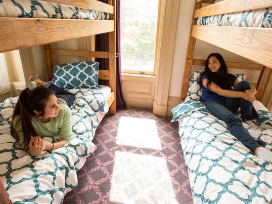 hostellers in a dorm room at HI Sacramento hostel