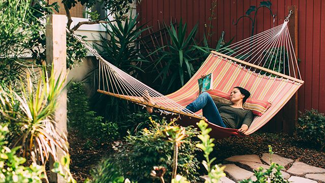 woman relaxing in a hammock