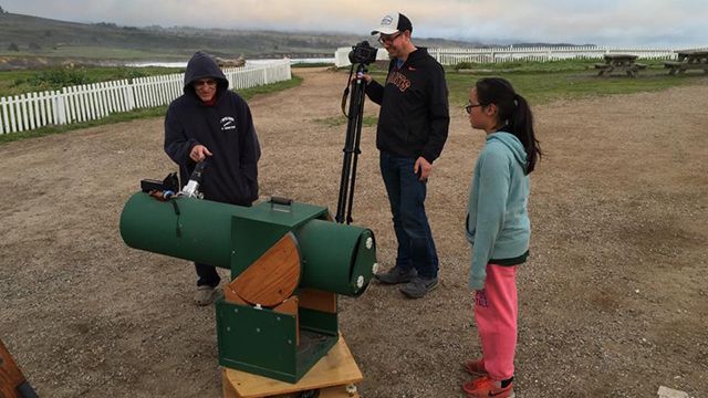 hostellers stargazing near Pigeon Point Lighthouse