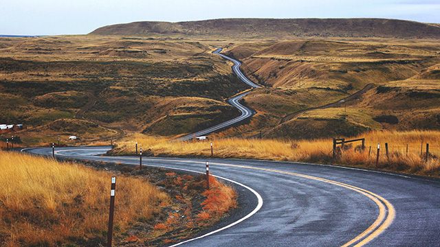 a road winding through the hills