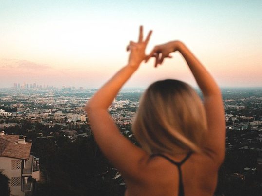woman looking out over los angeles