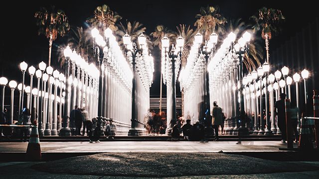 columns in front of the lacma museum at night