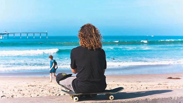 a skateboarder at Mission Beach in San Diego