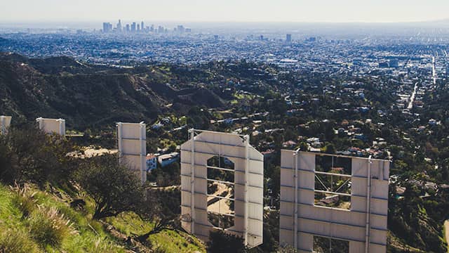 a view of LA from behind the Hollywood sign