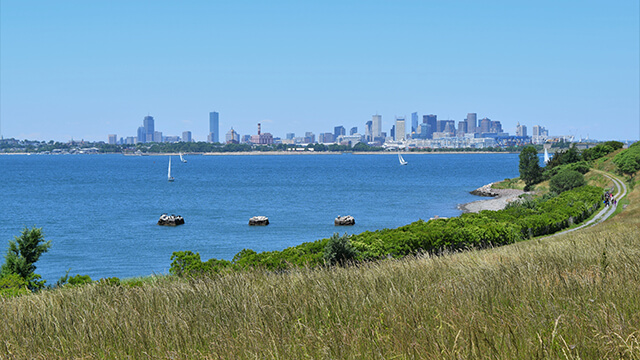 the view from one of the Boston Harbor Islands out across the Bay and towards the Boston skyline