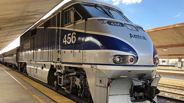 a view of an amtrak train from the front