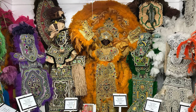 colorful handmade costumes with feathered headdresses and sequins at the backstreet cultural museum in new orleans