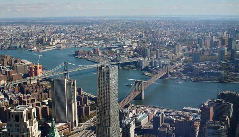 an aerial view of lower manhattan and brooklyn