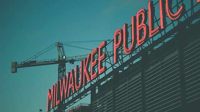 a neon sign for the milwaukee public market