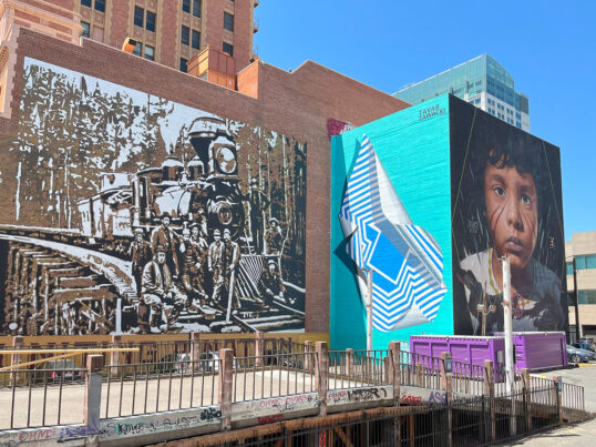 a mural in downtown Sacramento covers the sides of two buildings