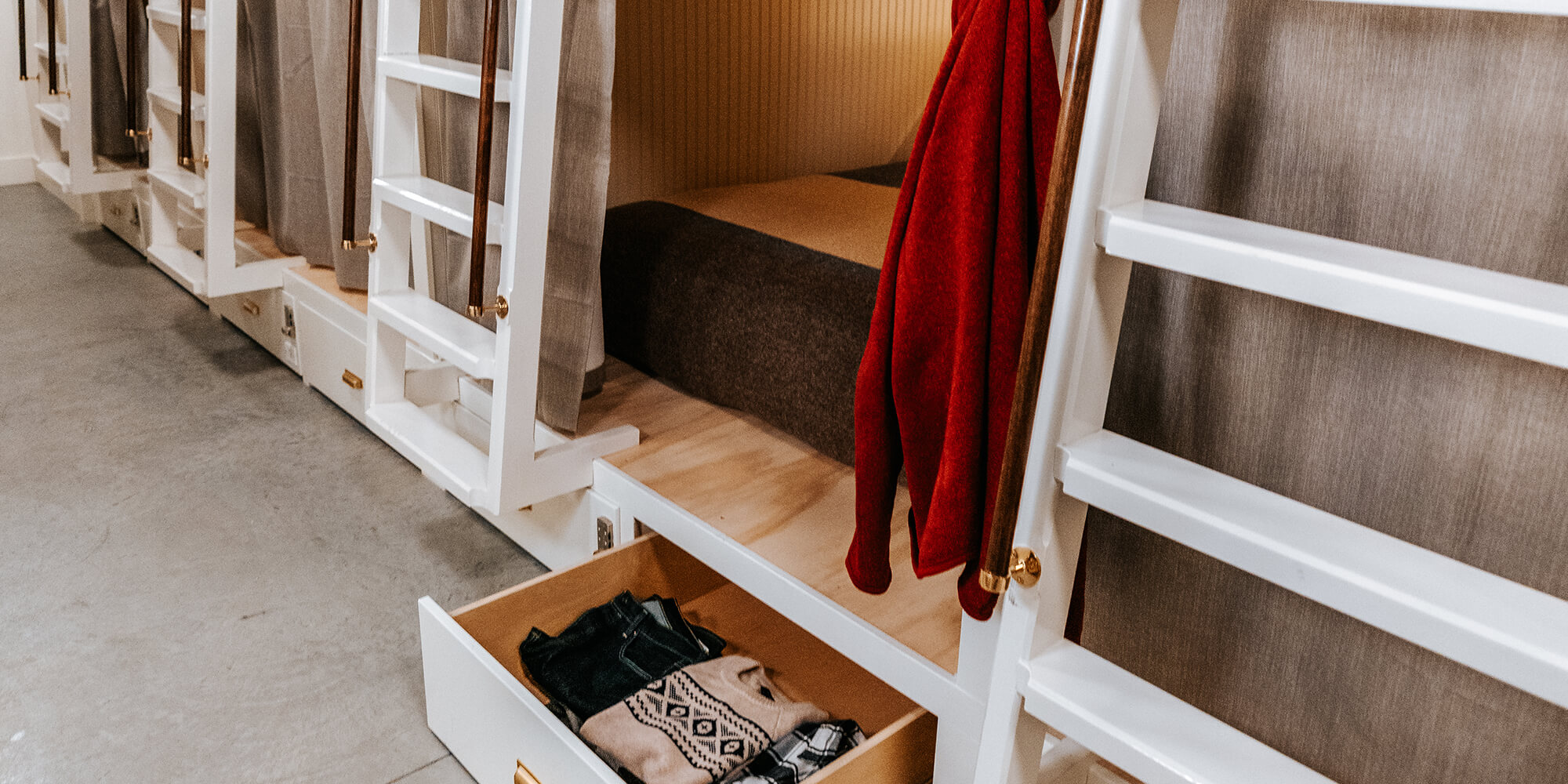 a pod-style bunk bed at HI Jackson hostel - the cache house