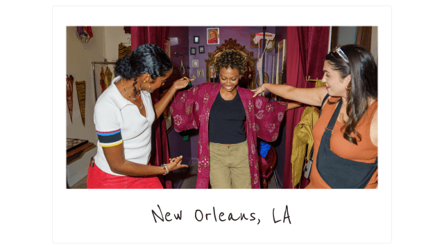 a polaroid of three young women shopping at a thriftstore