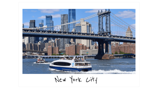 a polaroid photo of a public ferry on the water going by the Manhattan Bridge in New York City