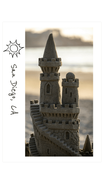 a polaroid of an intricate sandcastle