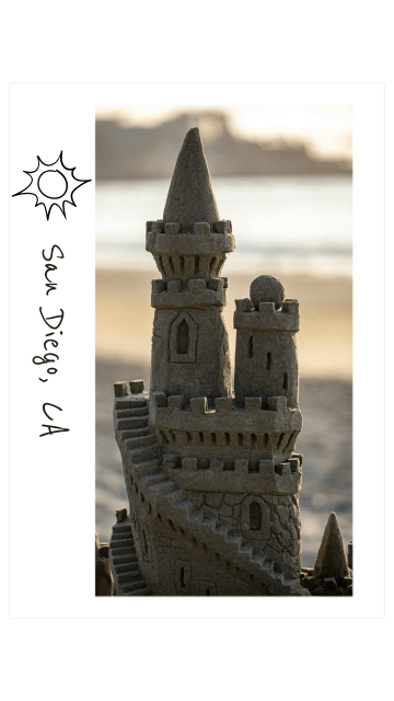 a polaroid of an intricate sandcastle 