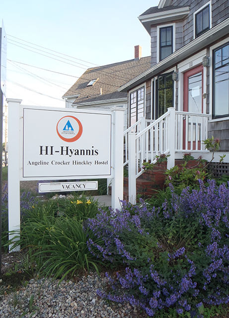 A sign outside HI Hyannis hostel with the name Angeline Crocker Hinckley on it.