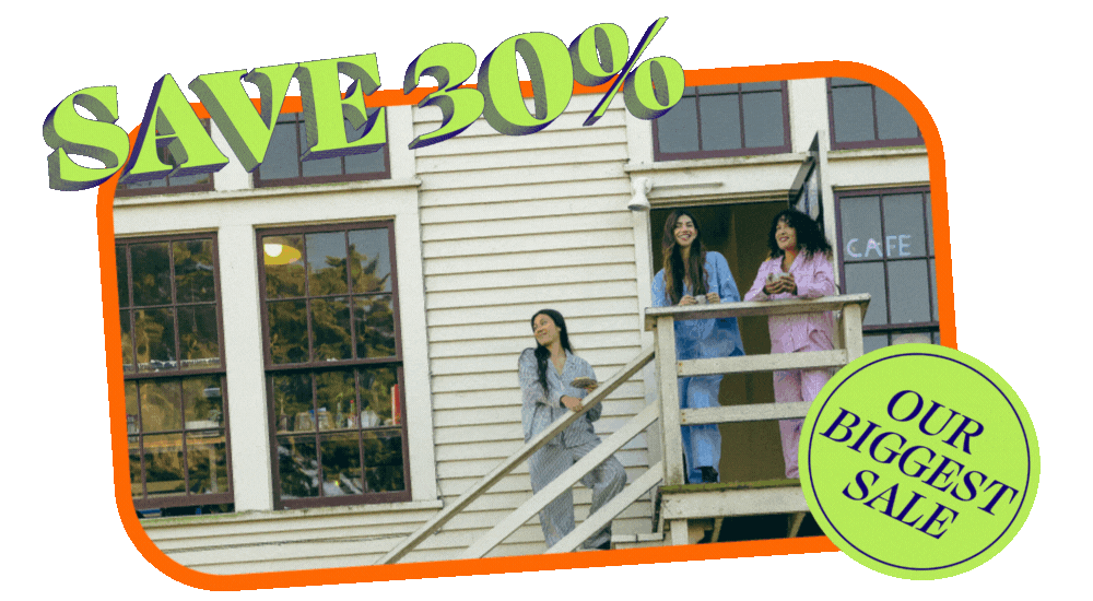 Three young women in striped pajamas stand outside a white building holding cups of coffee. Text overlay reads 