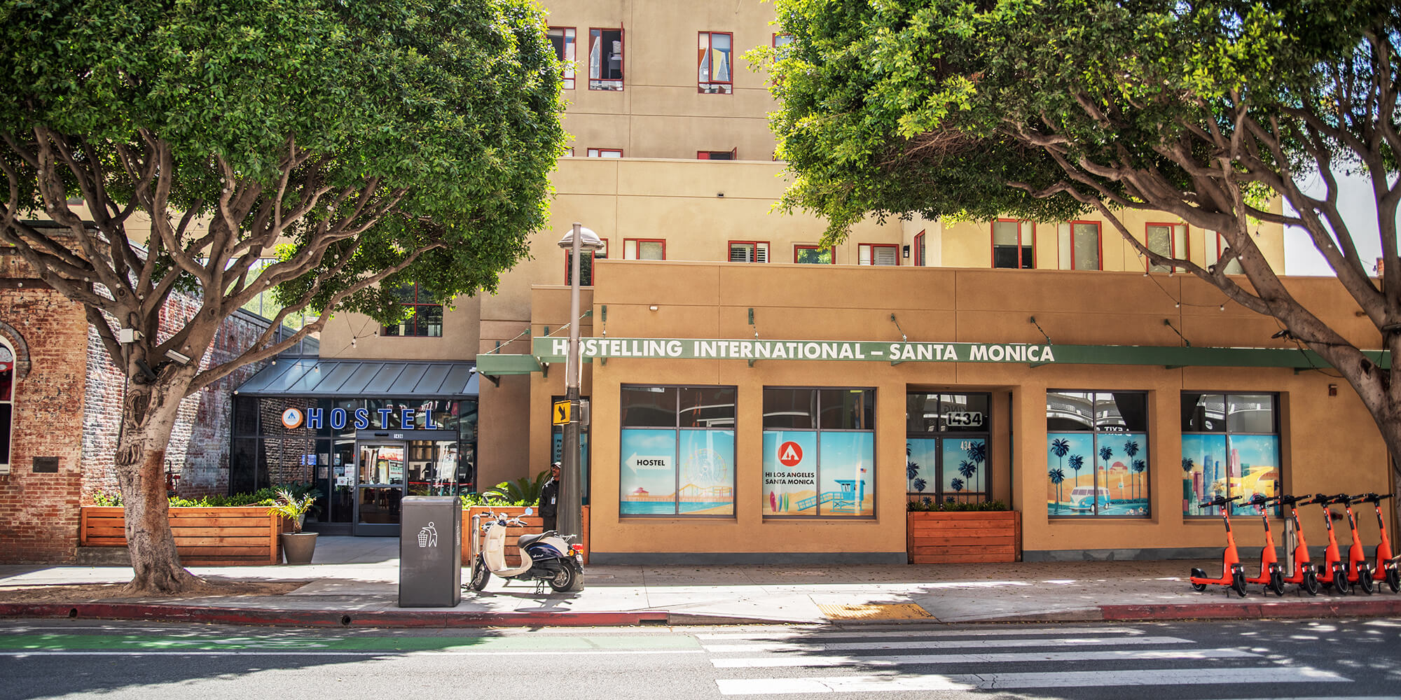 The exterior of HI Los Angeles Santa Monica hostel on a sunny day