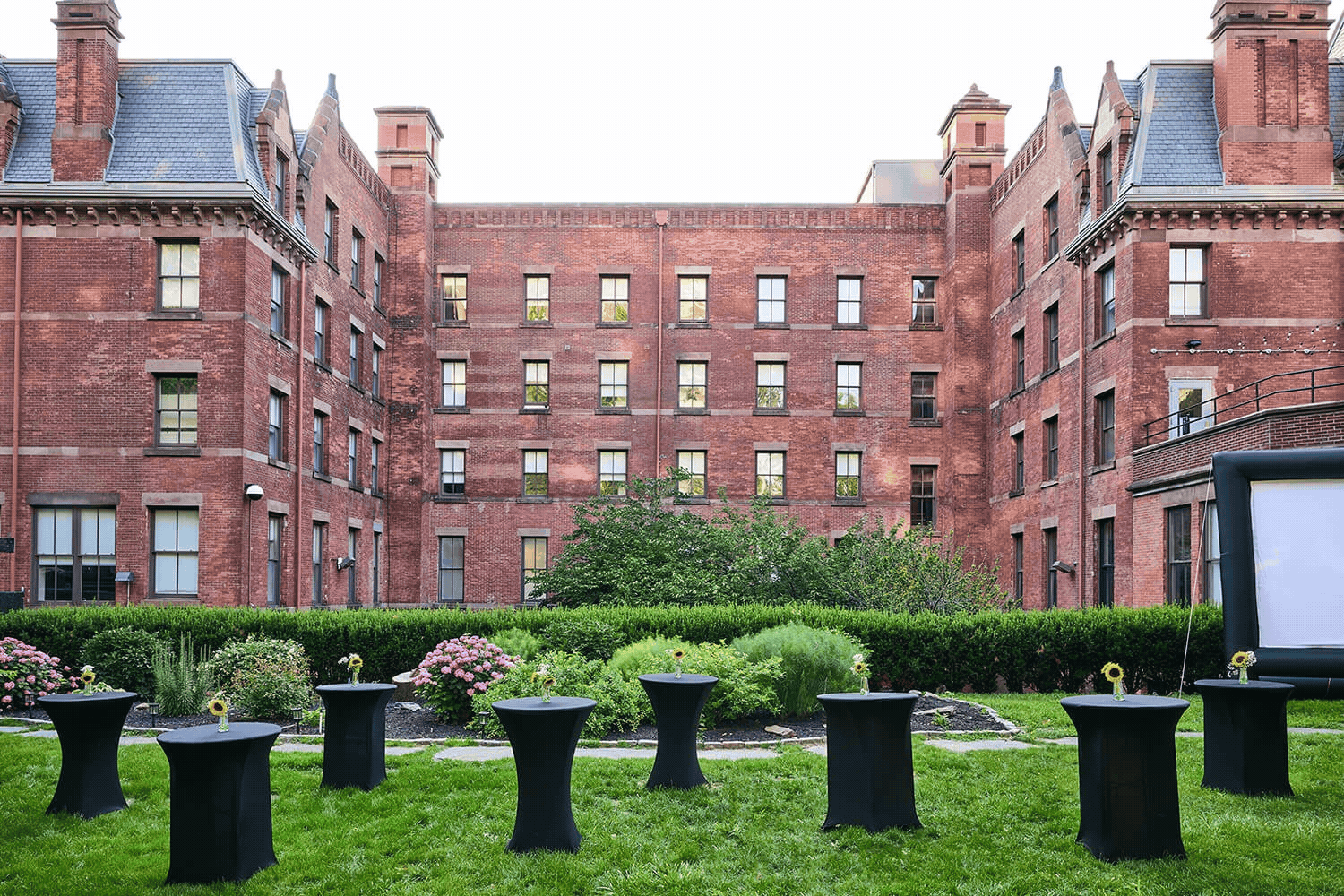 The greenspace at HI New York City can be furnished with tables, an inflatable screen with projector, and more.